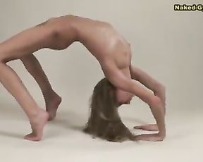 Sexy teen Masha caught in action of naked gymnastics