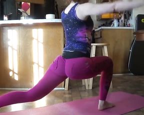 Sexy redhead MILF in tight leggings doing yoga