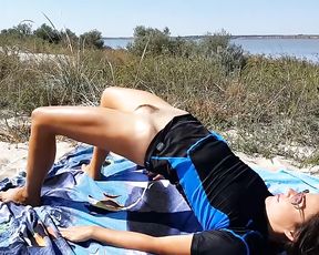 Bottomless MILF gets fucked doing nude yoga on the public beach